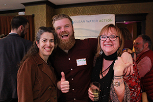 Kristine Acevedo (left) and Clean Water Action Advisory Board Member Jeremy Shenk (middle) smile with NE Director Cindy Luppi. 