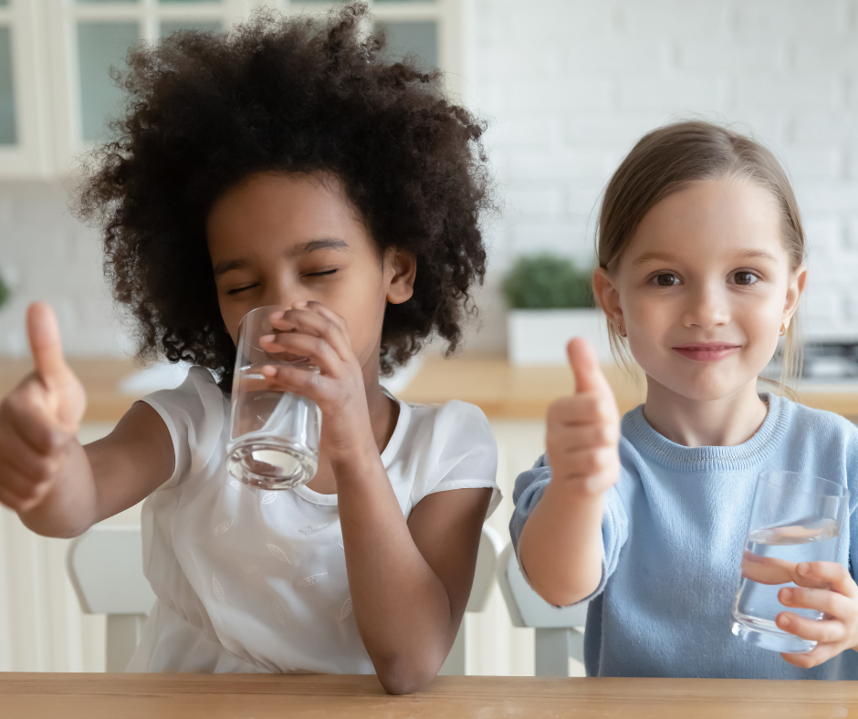 Children Giving Thumbs Up to Drinking Water