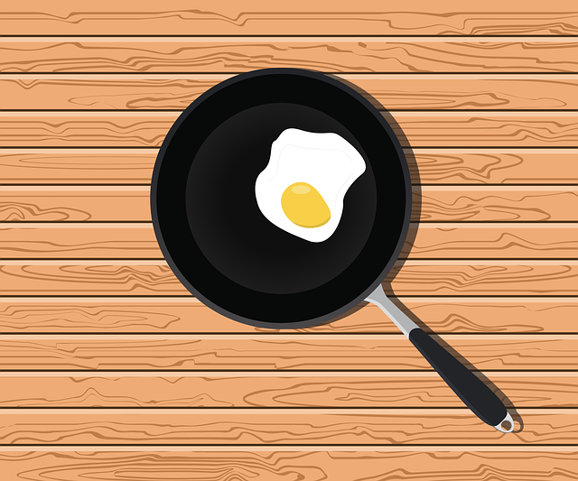 nonstick pan with an egg in it